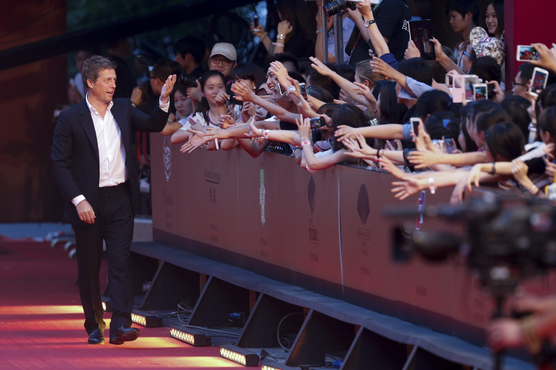 Britský herec Hugh Grant byl minulou sobotu hvězdou Šanghajského filmového festivalu.
Autor: ČTK, AP