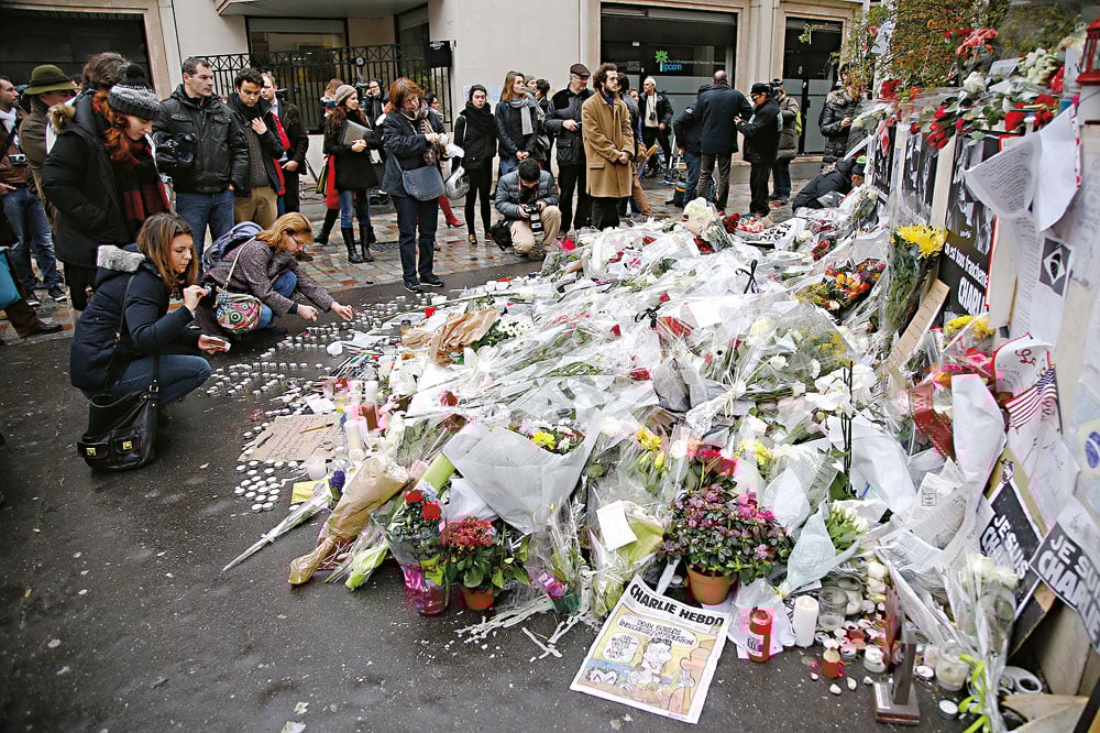 Vlna solidarity před redakcí Charlie Hebdo
Autor: Globe Media /  Reuters