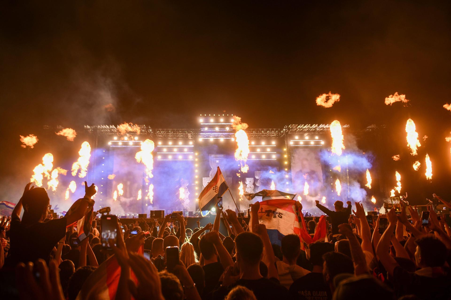 Sinj, Croatia. 04th Aug, 2025. People enjoy the Marko Perkovic Thompson concert at Hipodrom in Sinj, Croatia on August 4, 2025. Around 150,000 people are expected to attend the concert. Credit: Pixsell/Alamy Live News